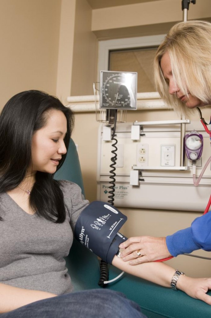 A patient's blood pressure being taken
